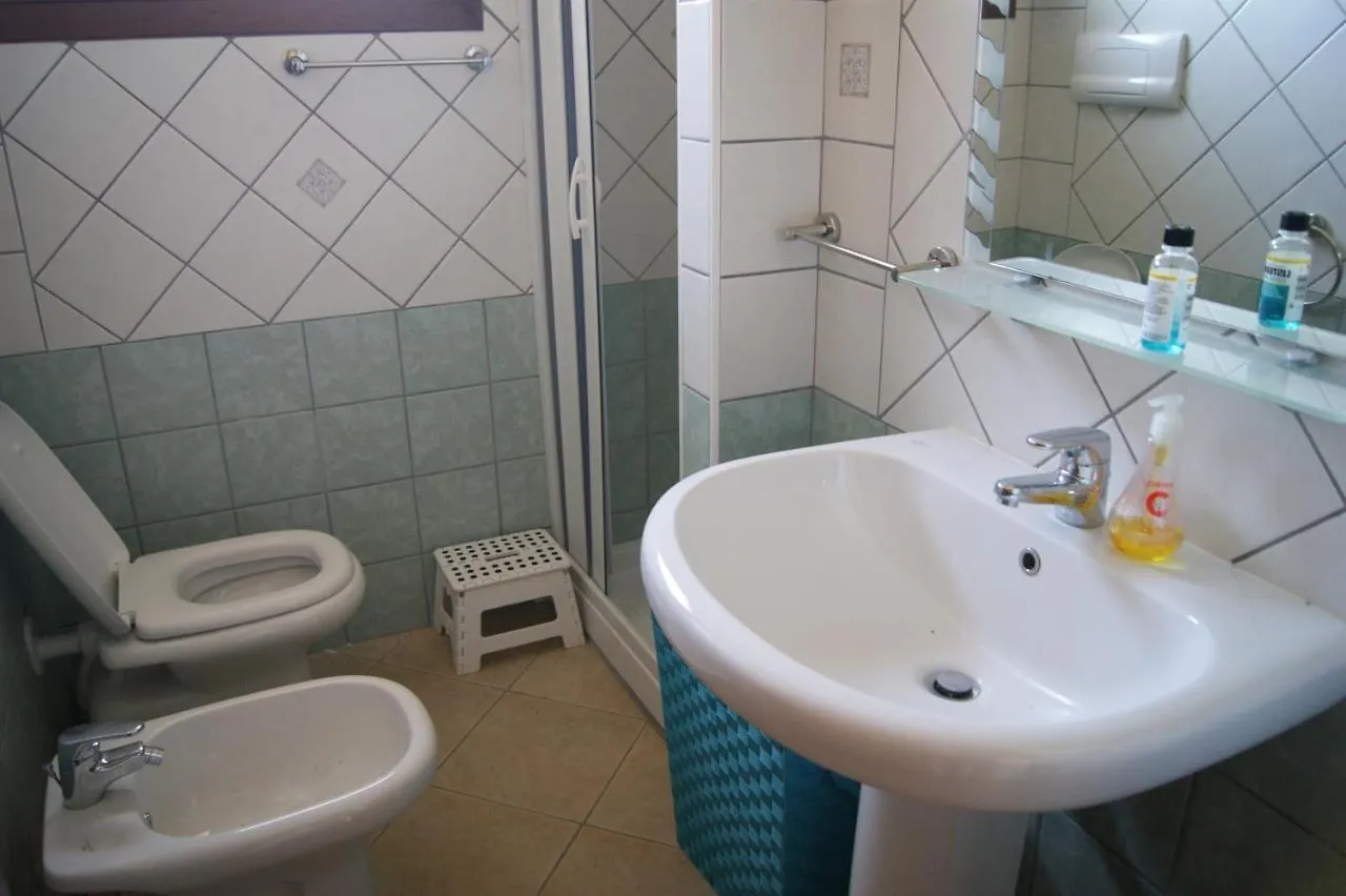 Casa vacanze beachfront- sulla spiaggia villetta indipendente Budoni Italia
