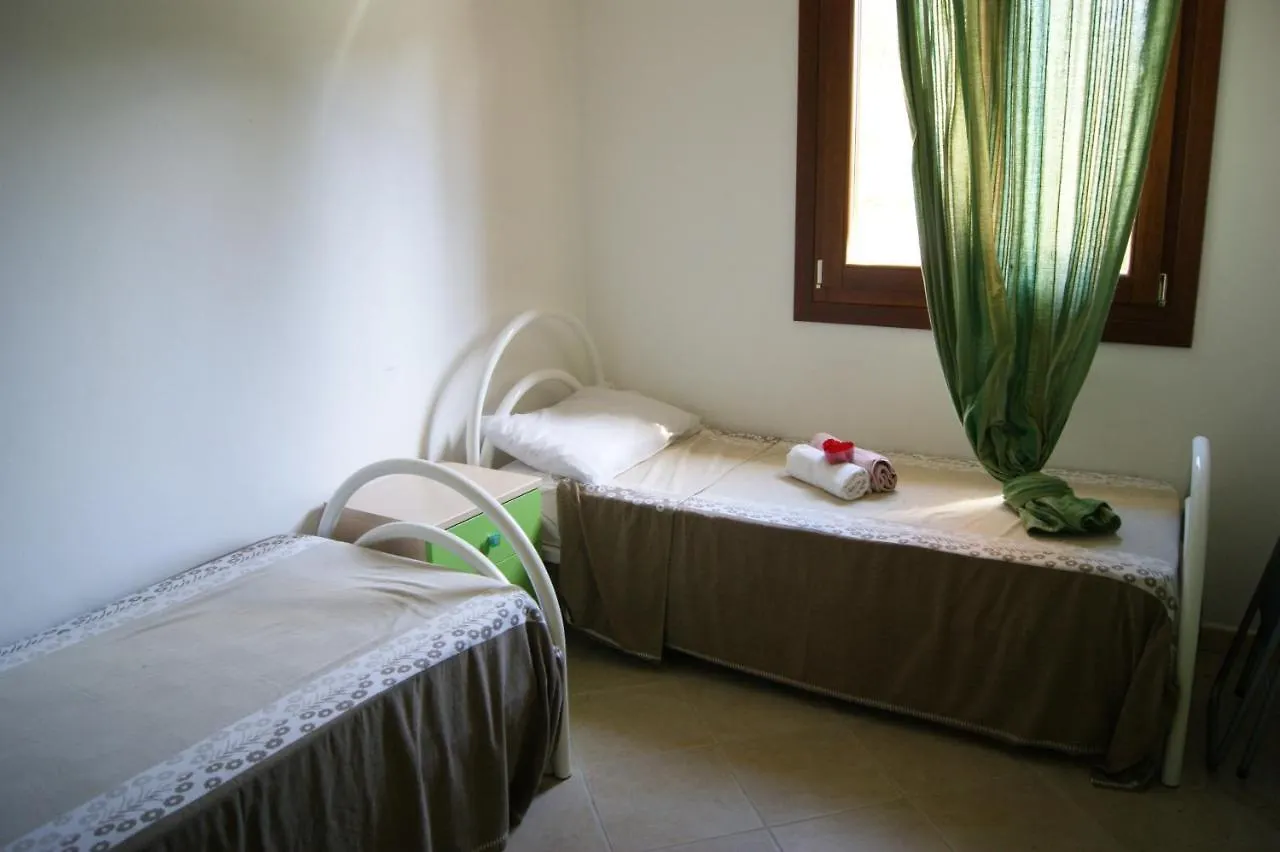 Casa vacanze beachfront- sulla spiaggia villetta indipendente Budoni